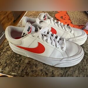 Women’s size 9 Nike legacy court lift. Orange swish with leopard print